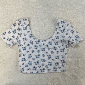 White with blue floral Forever 21 scoop neck crop top with white lacy back